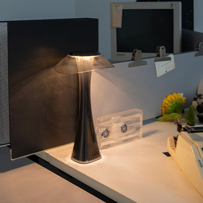 Nordika Moderne sort designer bordlampe med transparent skærm og varmt LED-lys på moderne skrivebord